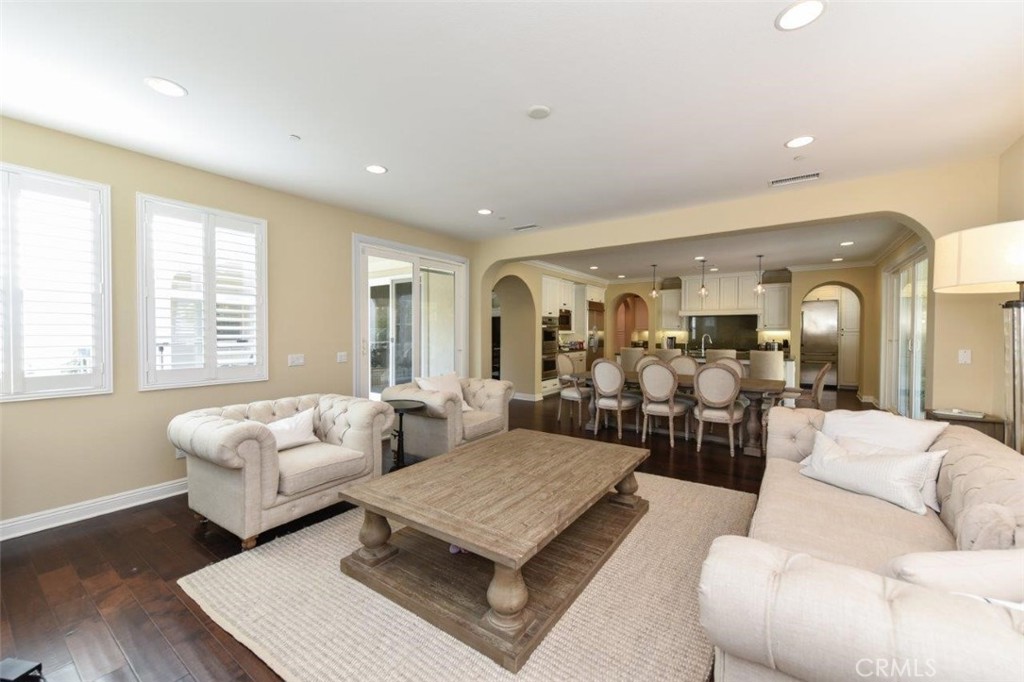 107 Fairgrove Irvine, CA 92618 - Photo 7 of 31 a living room with furniture rug and window