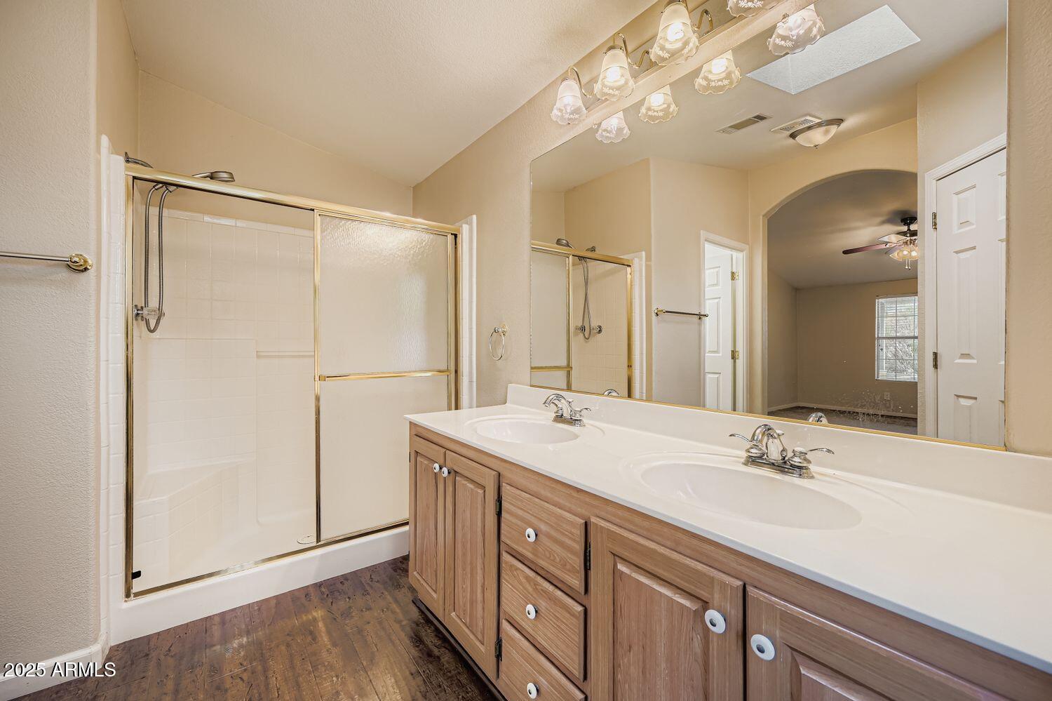 2550 South Ellsworth Road, Unit 277 Mesa, AZ 85209 - Photo 15 of 20 a bathroom with a sink double vanity and a mirror