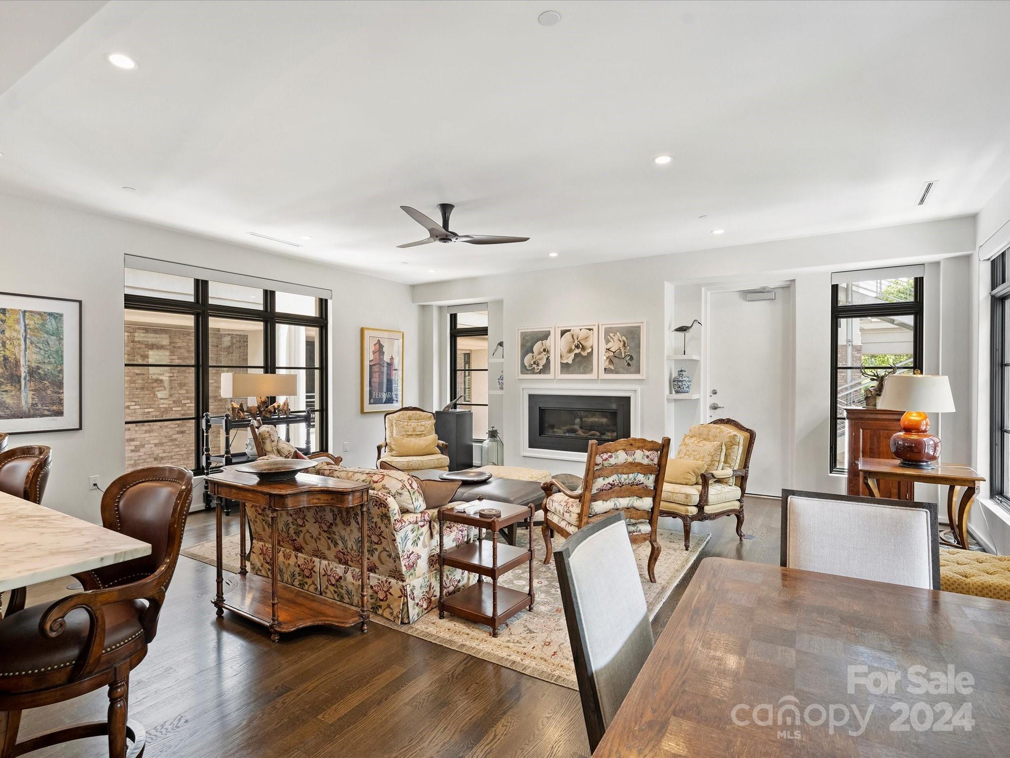 1333 Queens Road, Unit E3 Charlotte, NC 28207 - Photo 16 of 42 a living room with furniture and a window