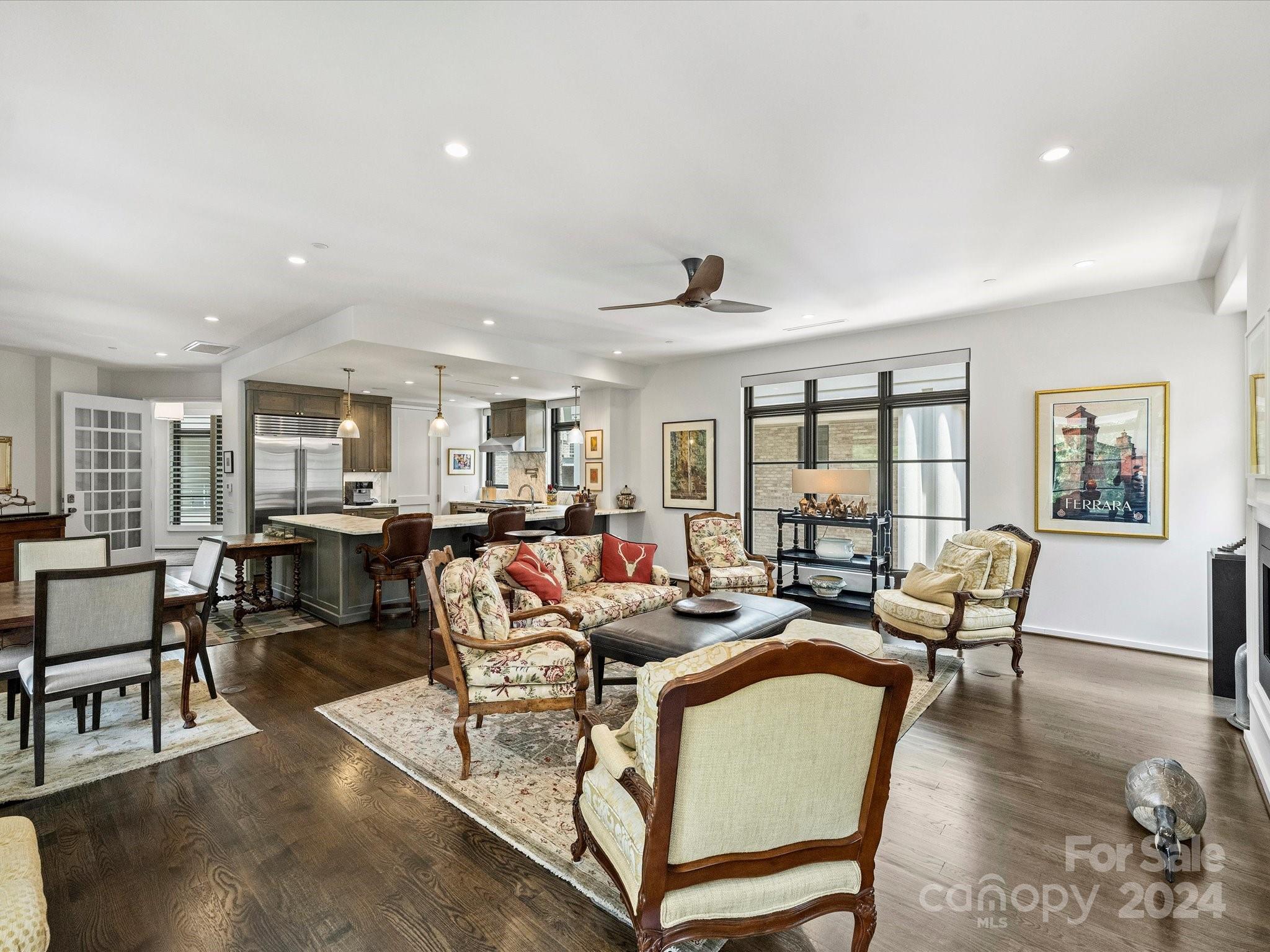 1333 Queens Road, Unit E3 Charlotte, NC 28207 - Photo 21 of 42 a living room with furniture and a wooden floor