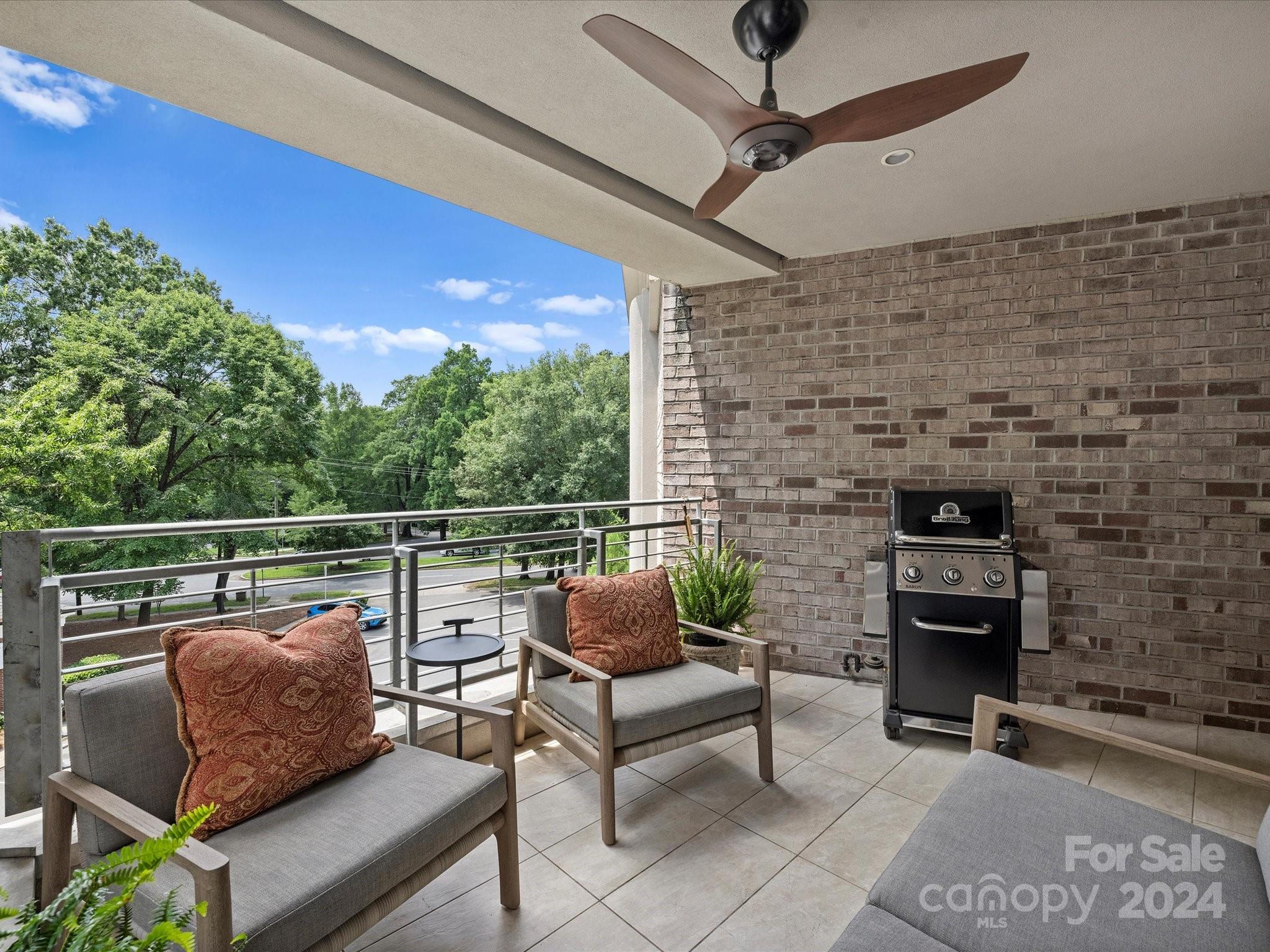 1333 Queens Road, Unit E3 Charlotte, NC 28207 - Photo 42 of 42 a outdoor living space with furniture and a fireplace