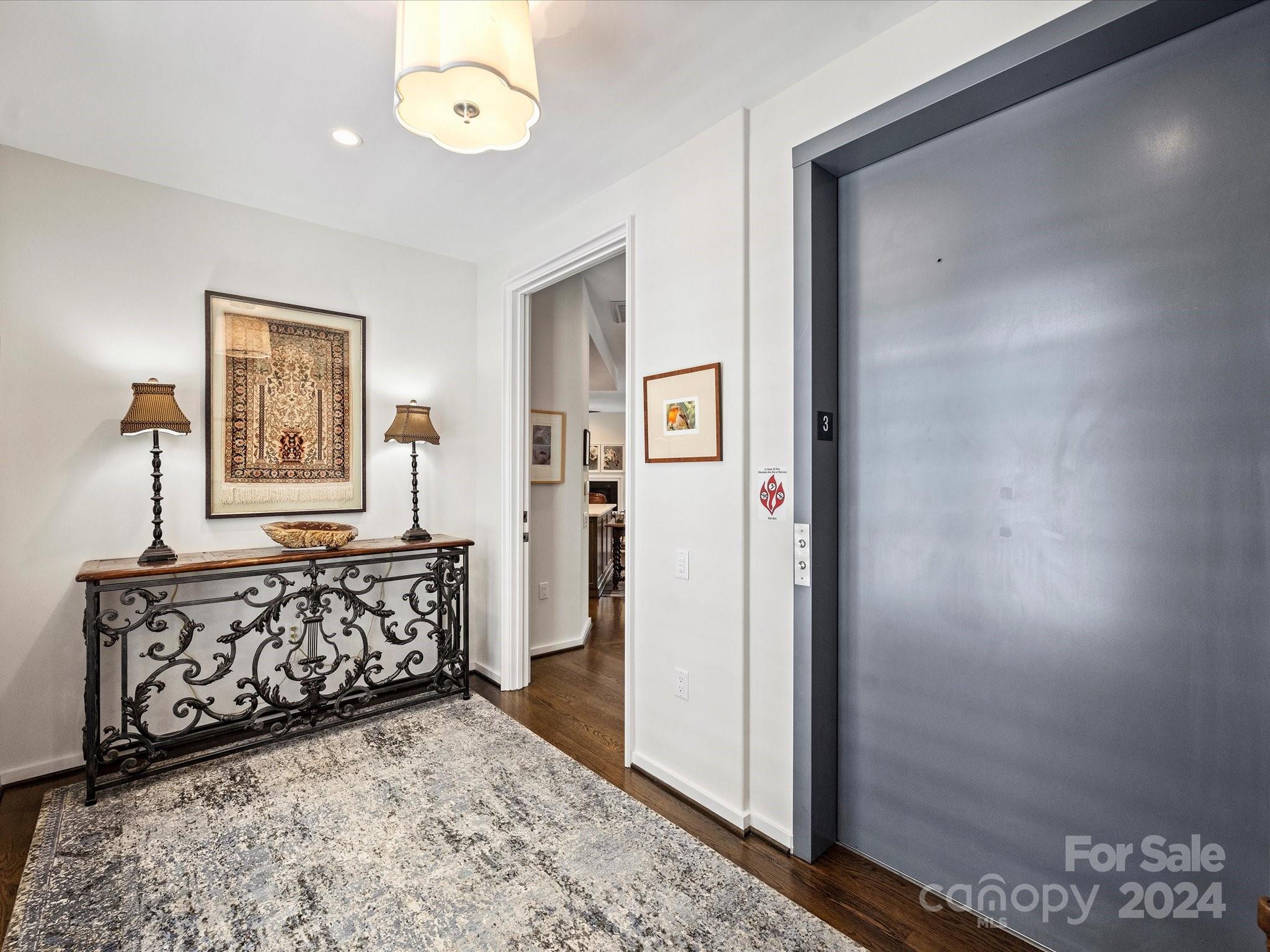 1333 Queens Road, Unit E3 Charlotte, NC 28207 - Photo 5 of 42 a view of a bedroom with bed and closet