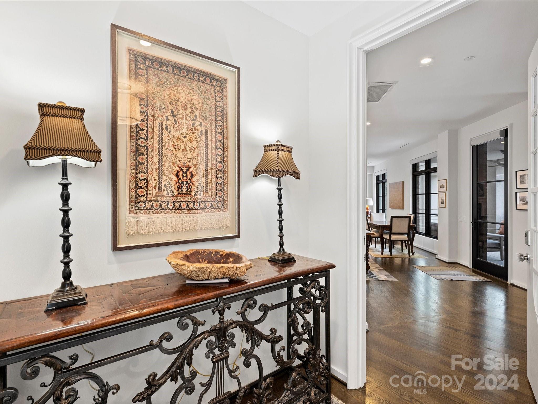 1333 Queens Road, Unit E3 Charlotte, NC 28207 - Photo 6 of 42 a living room with furniture and wooden floor