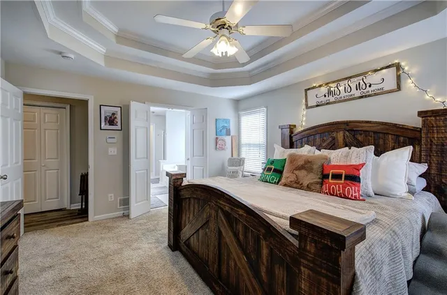 a bathroom with a double vanity sink a mirror and a bathtub