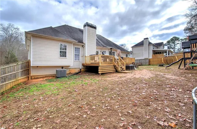 a view of a table and chairs in the patio