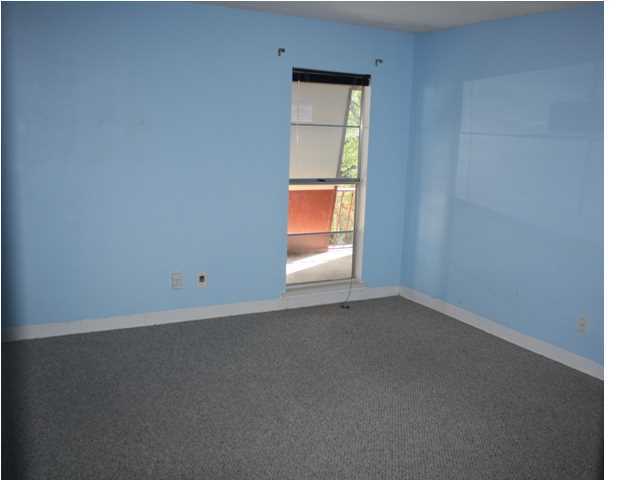 210 Pelham Road, Unit A207 Fort Walton Beach, FL 32547 - Photo 8 of 10 a view of an empty room with a window