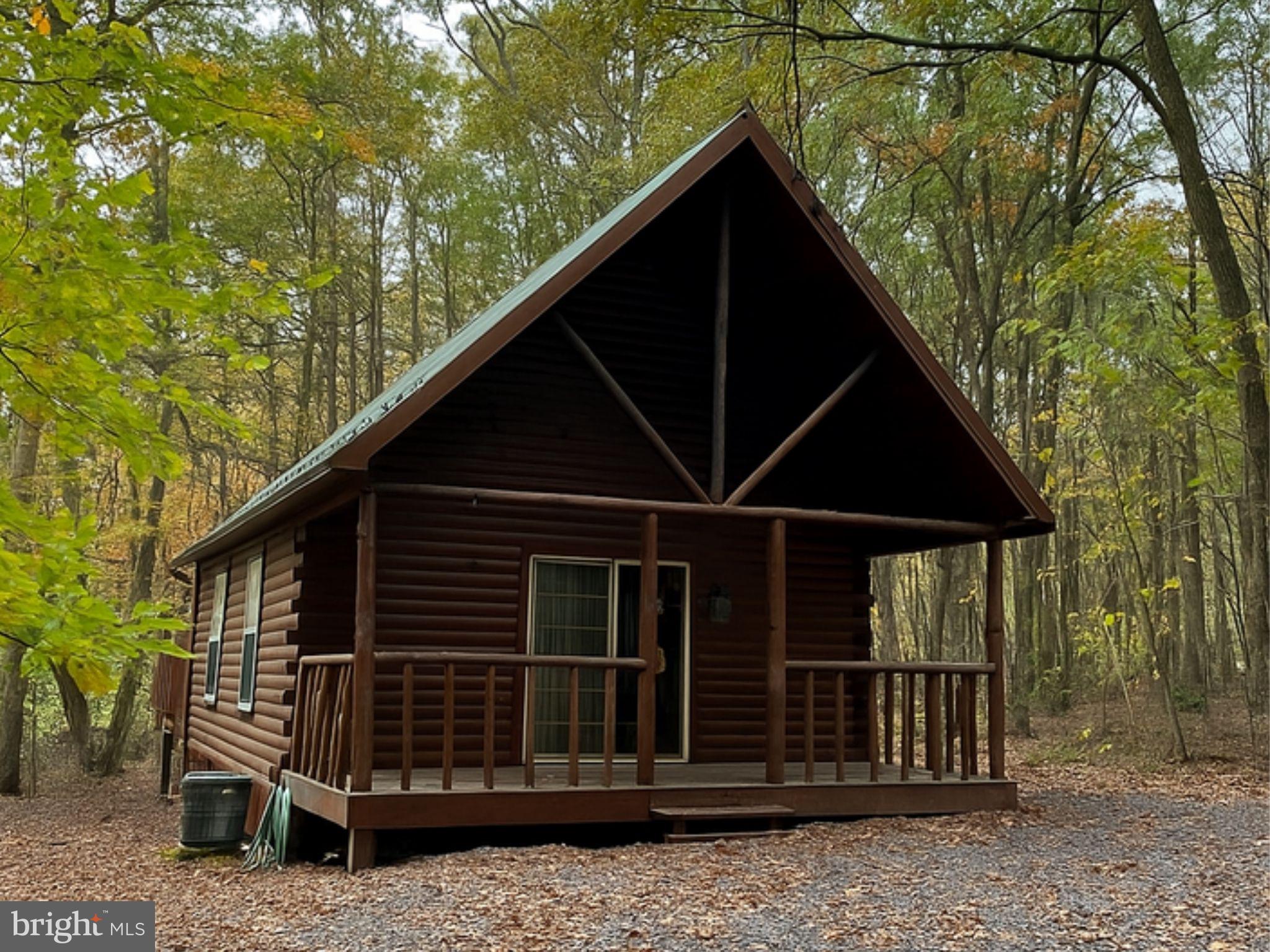 a front view of a house with parking space