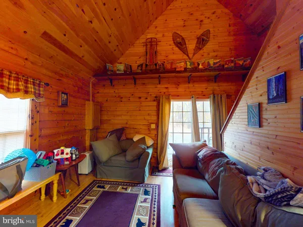 a living room with furniture and a couch