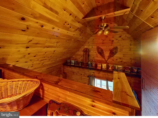a view of a balcony with wooden floor