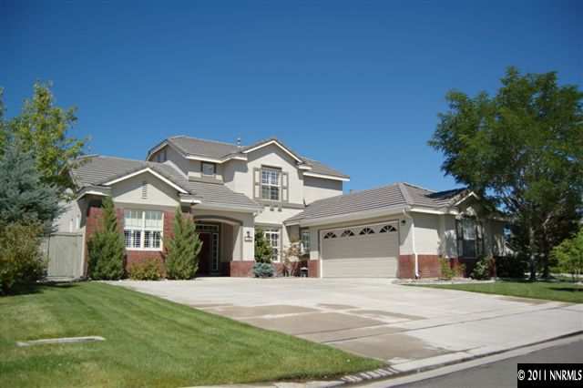 10377 Bronze Wood Court Reno, NV 89521 - Photo 1 of 1 a front view of a house with a garden