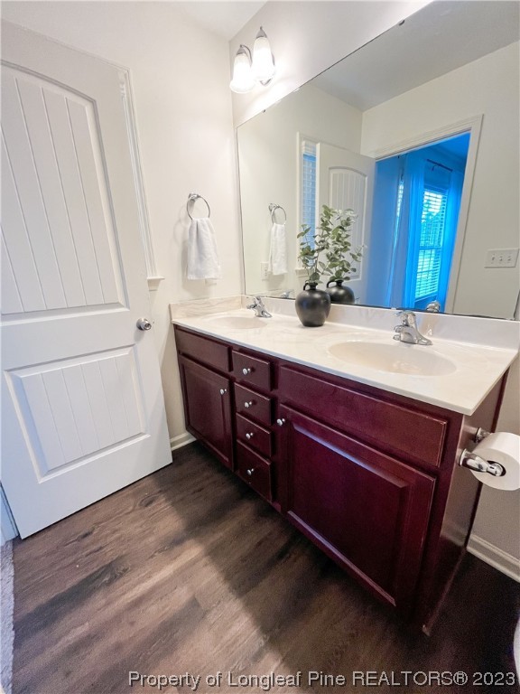 52 Expedition Drive Cameron, NC 28326 - Photo 14 of 19 a bathroom with a sink a mirror and a shower