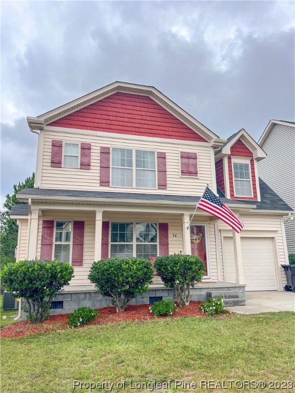 52 Expedition Drive Cameron, NC 28326 - Photo 2 of 19 front view of a house with a yard