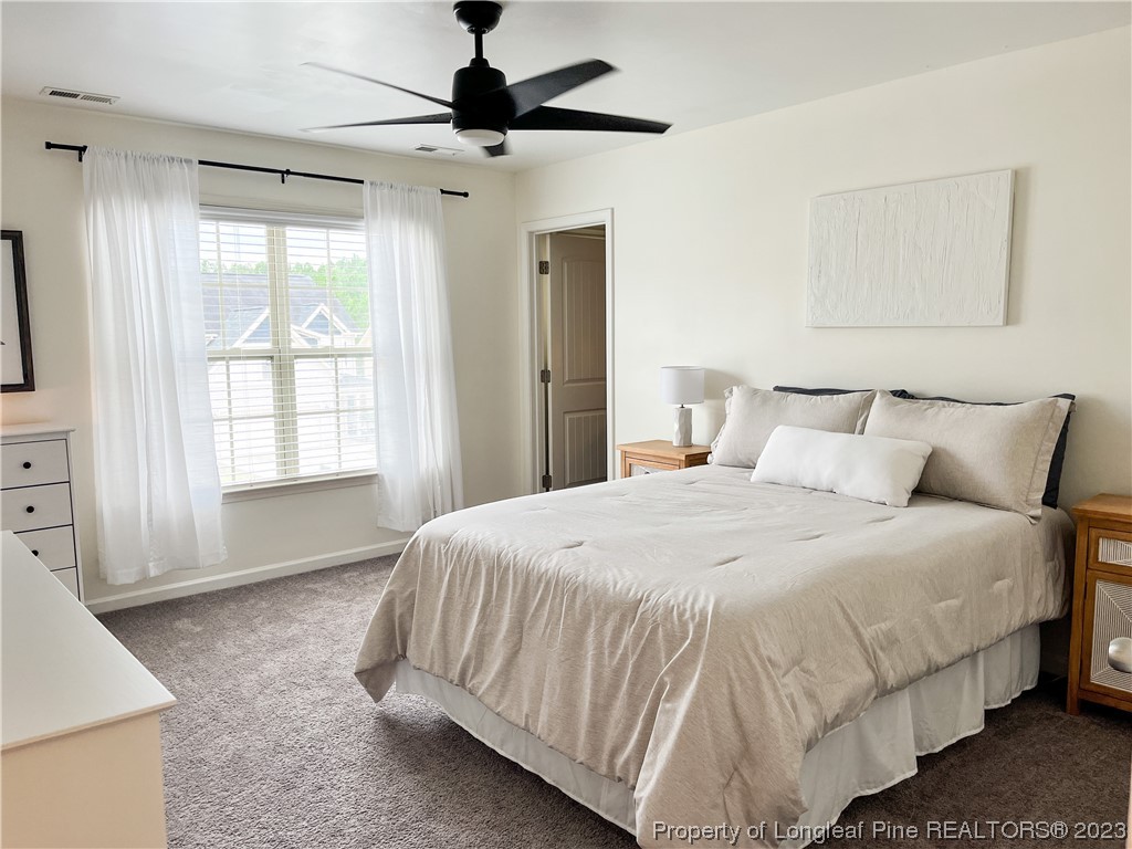 52 Expedition Drive Cameron, NC 28326 - Photo 3 of 19 a bedroom with bed and window