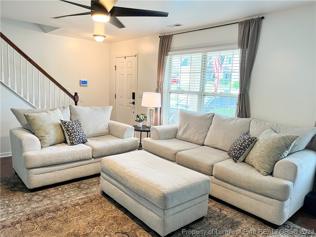 52 Expedition Drive Cameron, NC 28326 - Photo 8 of 19 a living room with furniture and a large window