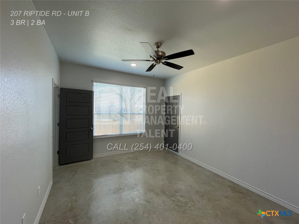 207 Riptide Road Temple, TX 76501 - Photo 10 of 13 a view of an empty room with a window