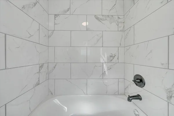 a bathroom with a bathtub