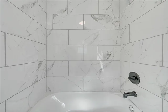 a bathroom with a bathtub