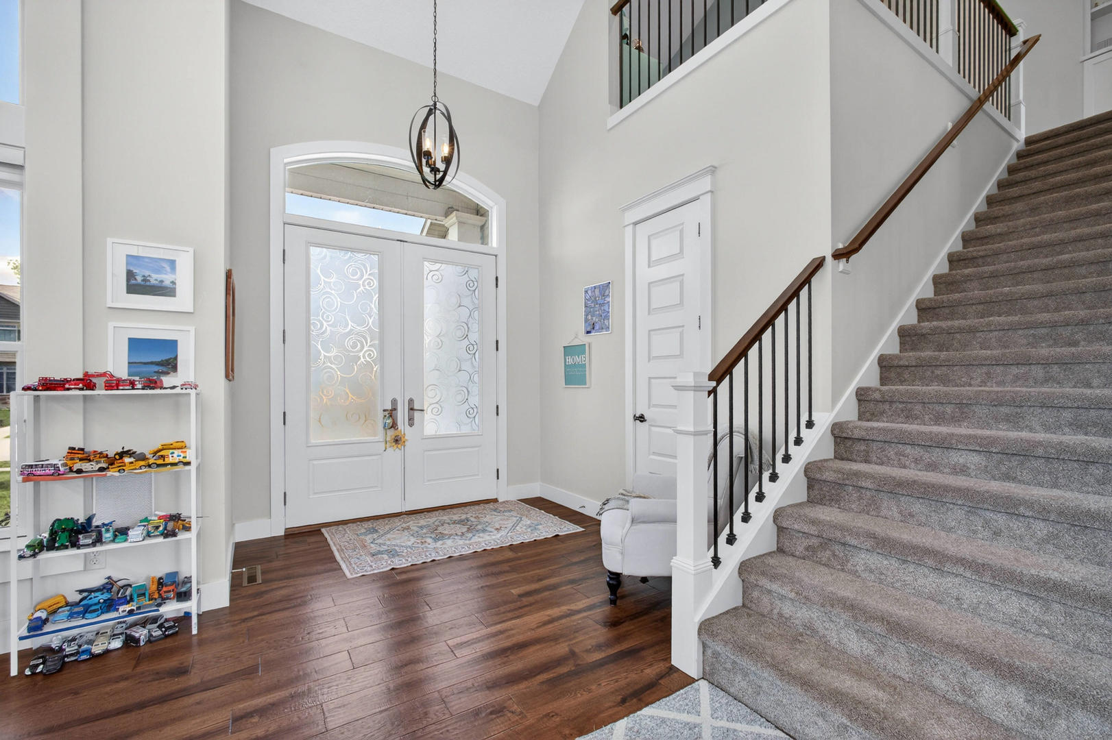 5700 Emily Road Bettendorf, IA 52722 - Photo 2 of 58 a view of entryway with wooden floor