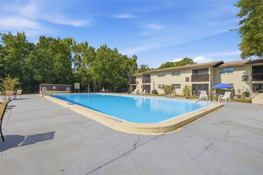 141 Fernery Road, Unit A3 Lakeland, FL 33809 - Photo 29 of 40 a view of outdoor space and swimming pool