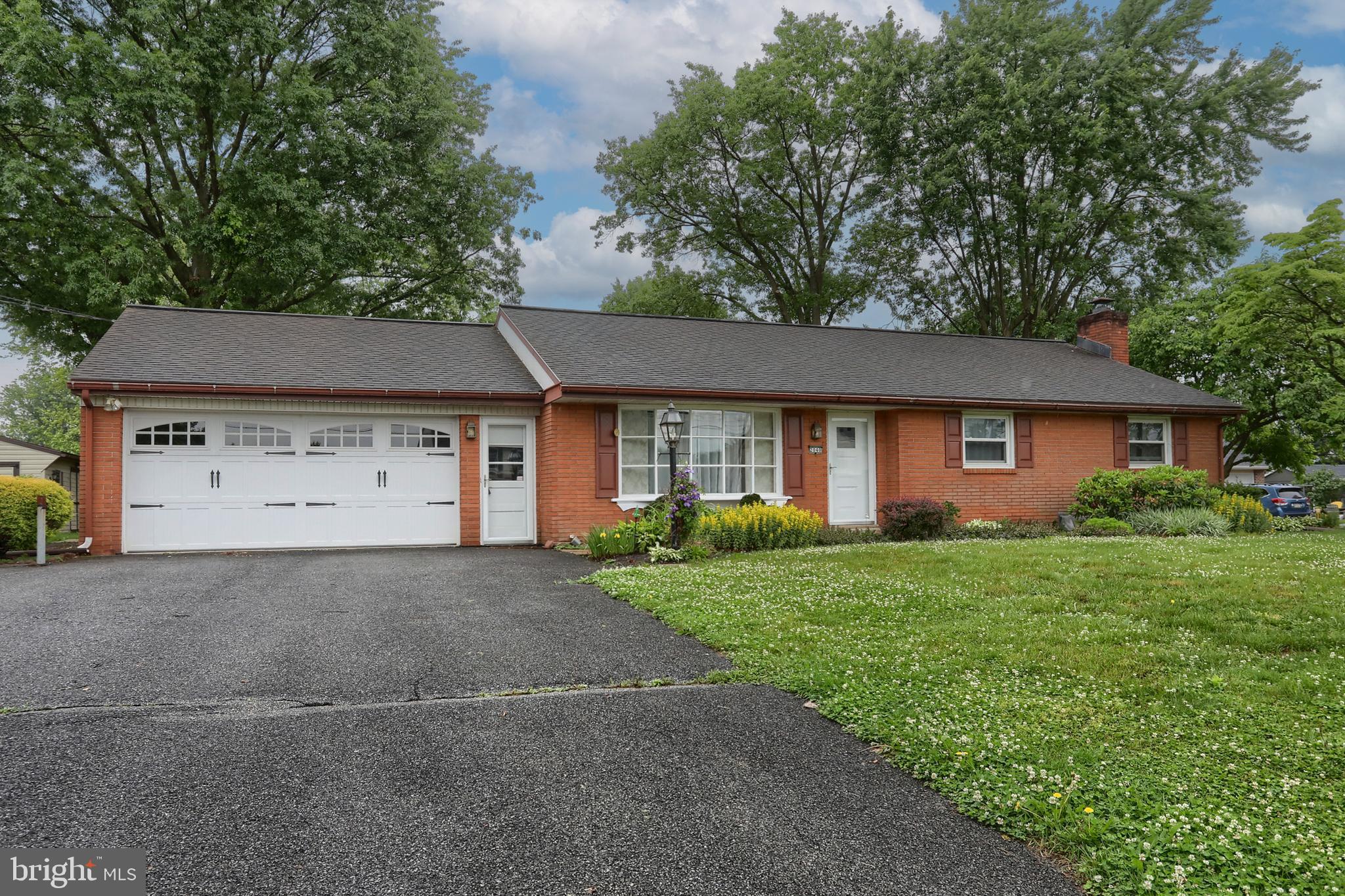 2040 Miller Road East Petersburg, PA 17520 - Photo 23 of 49 a front view of a house with a yard and garage
