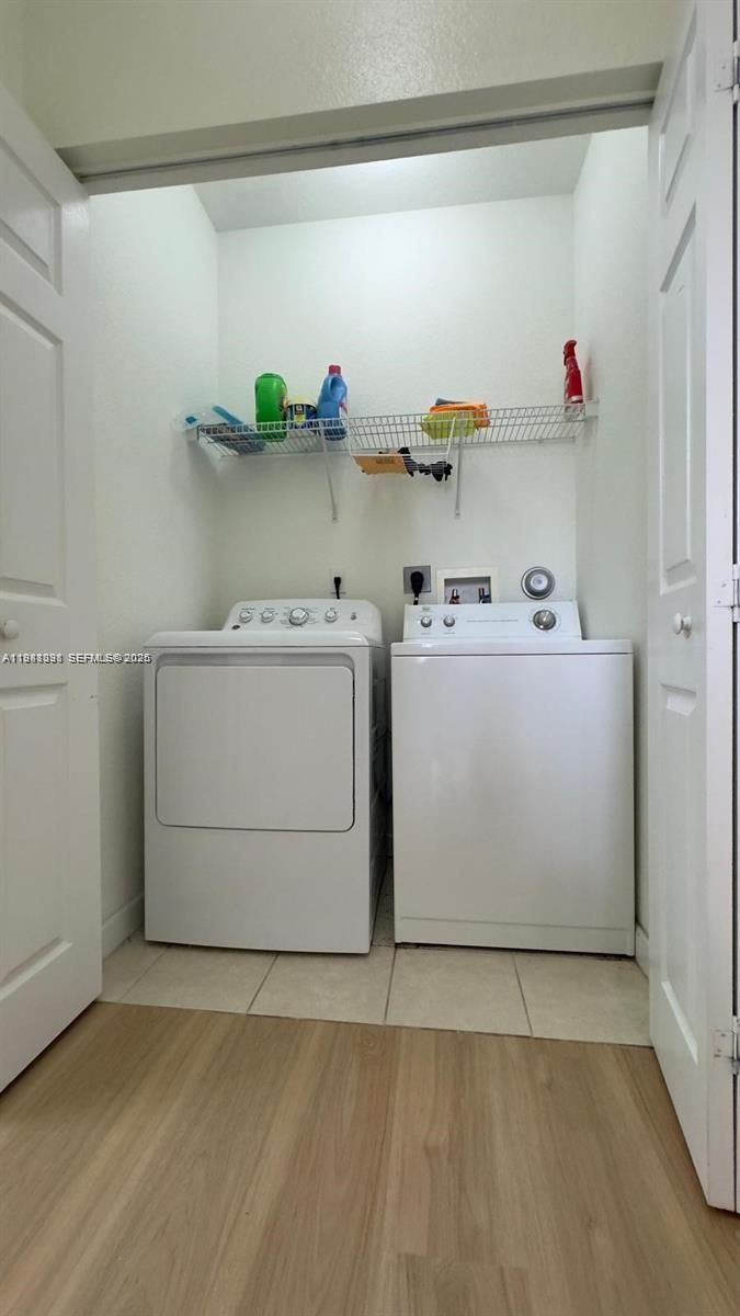 949 Northeast 42nd Avenue Homestead, FL 33033 - Photo 7 of 17 a utility room with dryer and washer