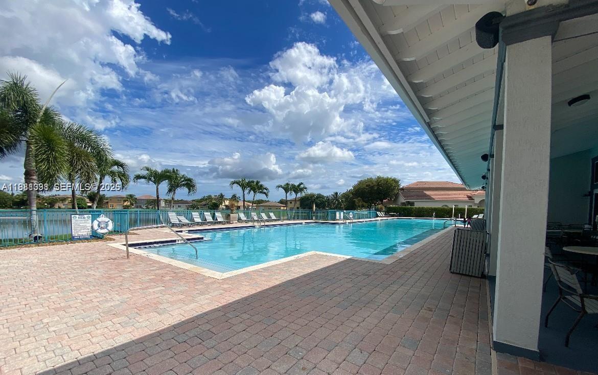 949 Northeast 42nd Avenue Homestead, FL 33033 - Photo 10 of 17 a view of a swimming pool and outdoor space