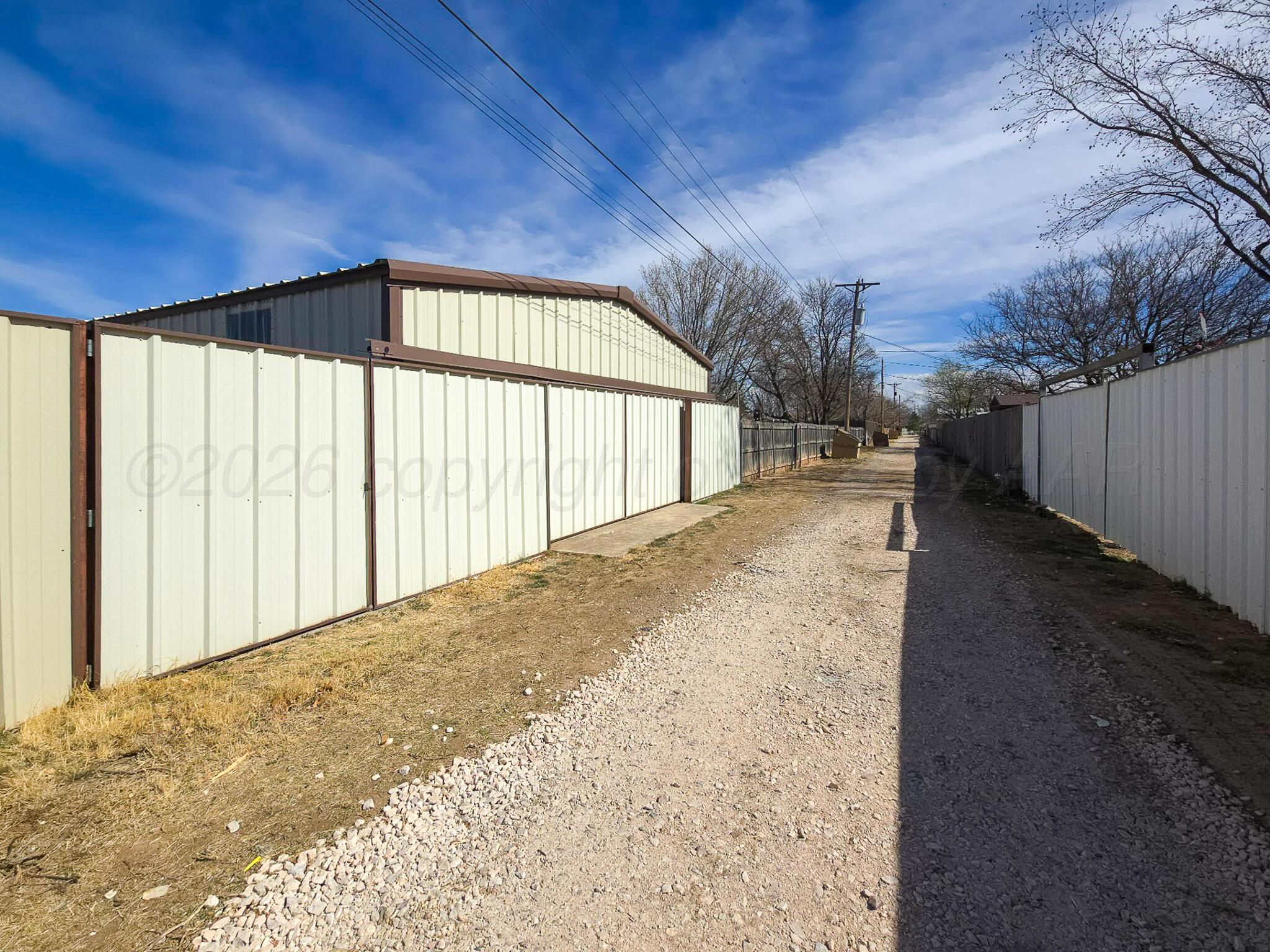 5019 Tulip Avenue Amarillo, TX 79110 - Photo 34 of 35 Alley Access with Sliding Gate