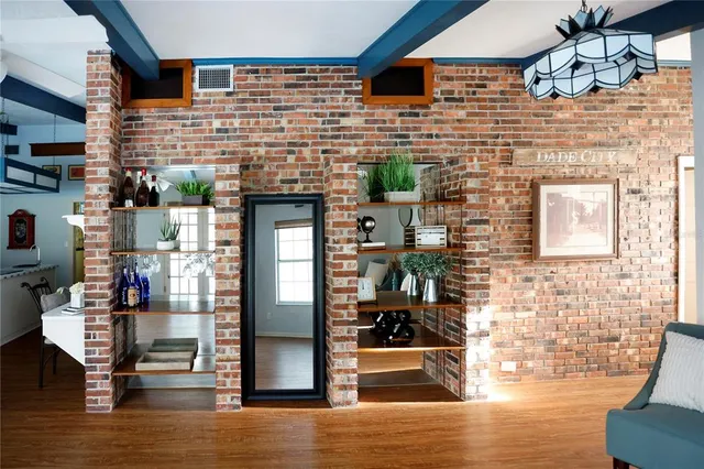 a kitchen with a sink and a stove top oven