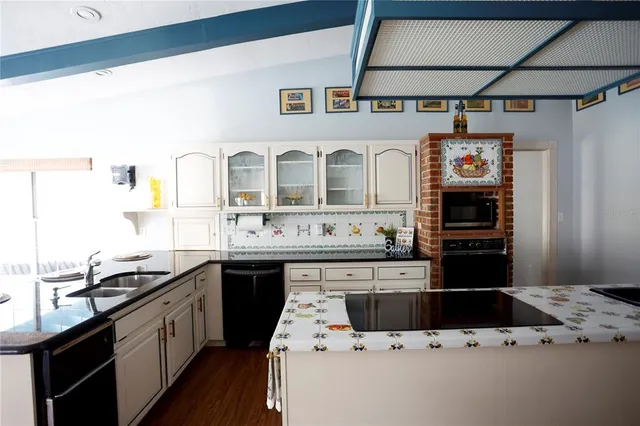 a bathroom with a sink double vanity and a mirror
