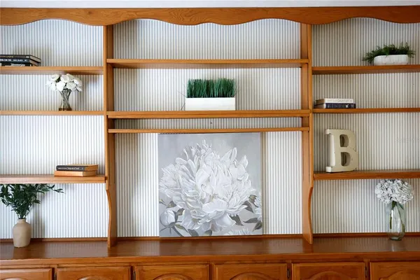 a view of a chandelier fan in a room