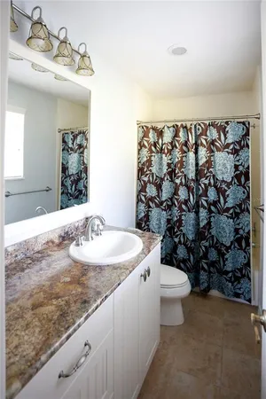 a view of a house with swimming pool in front of it