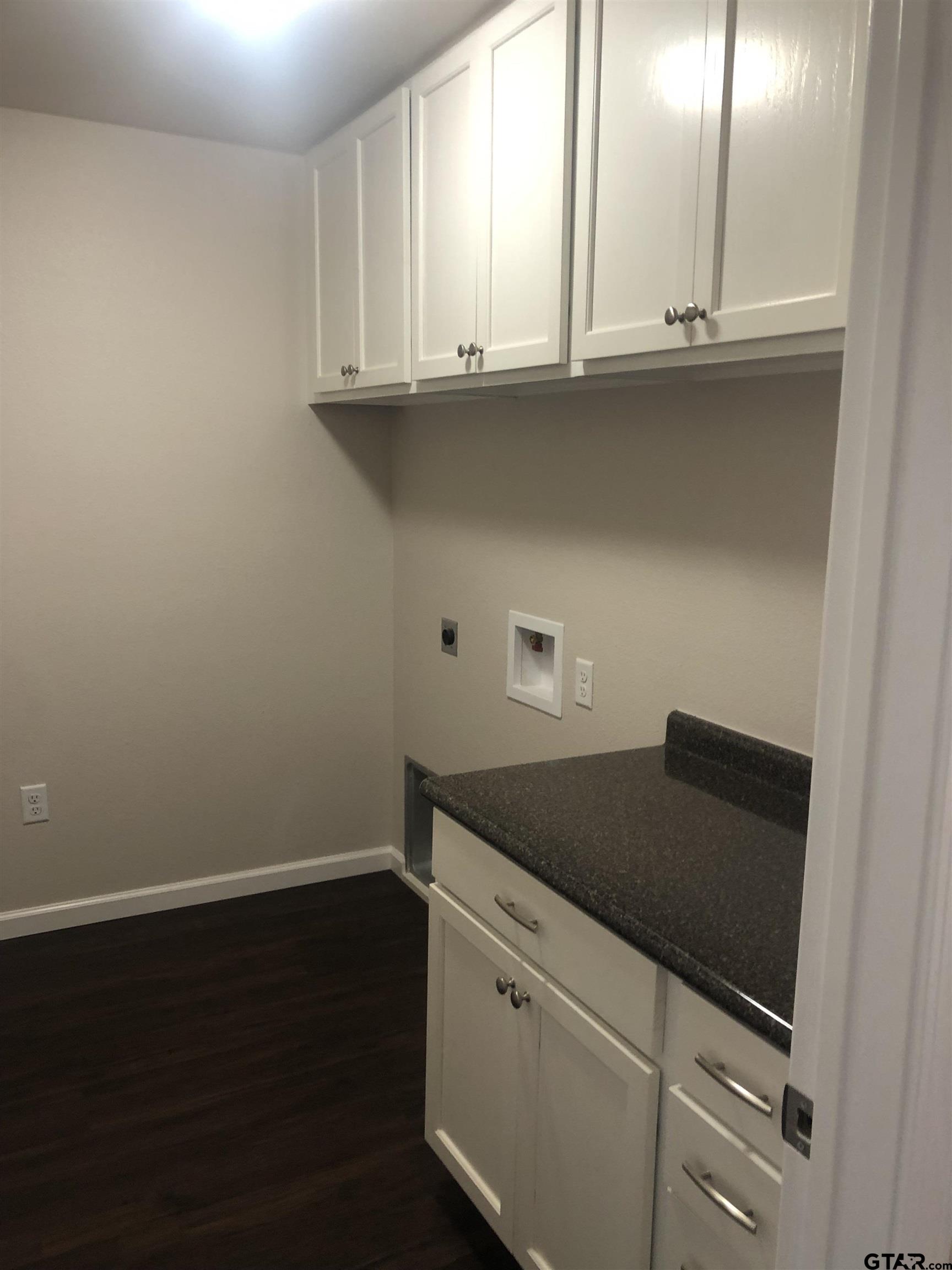 105 Meadows Lane Maud, TX 75567 - Photo 5 of 19 an empty room with wooden floor