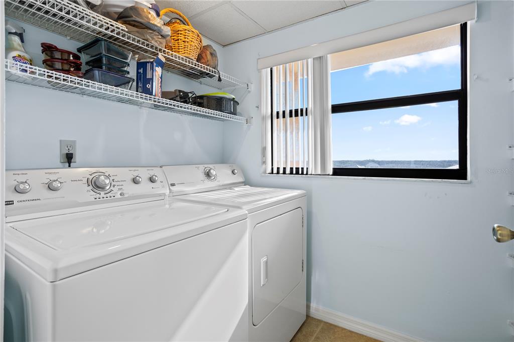 30 Inlet Harbor Road, Unit 5030 Ponce Inlet, FL 32127 - Photo 26 of 52 a utility room with dryer and washer