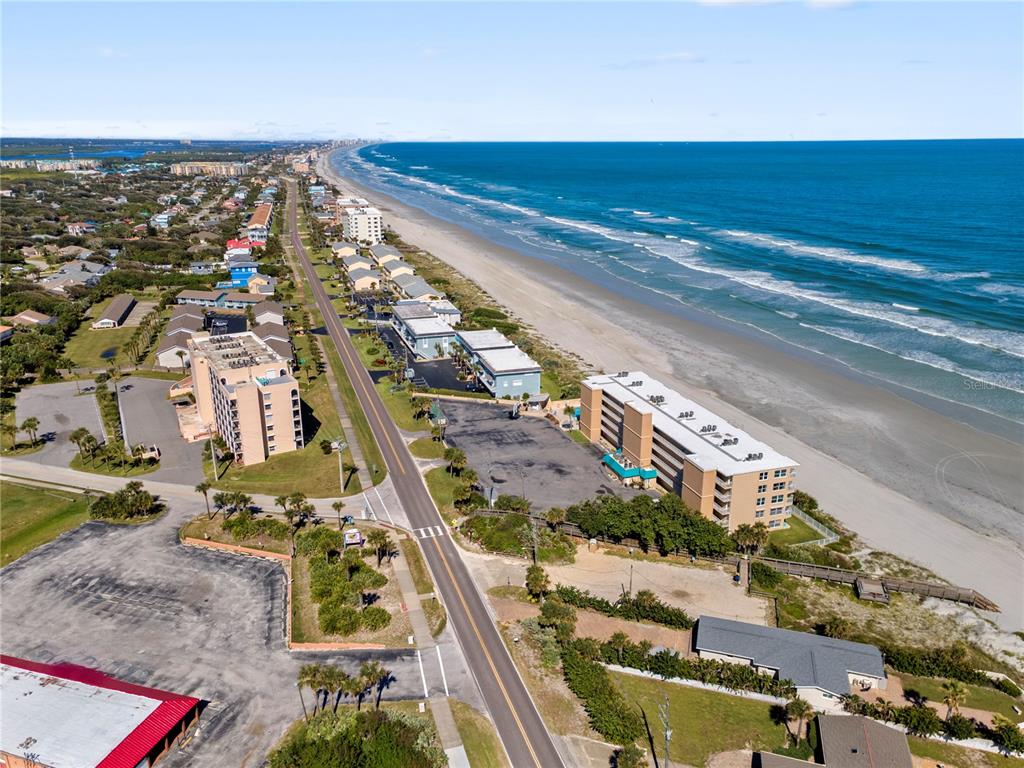 30 Inlet Harbor Road, Unit 5030 Ponce Inlet, FL 32127 - Photo 47 of 52 an aerial view of residential houses with outdoor space