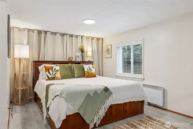 a kitchen with a refrigerator a stove top oven and cabinets