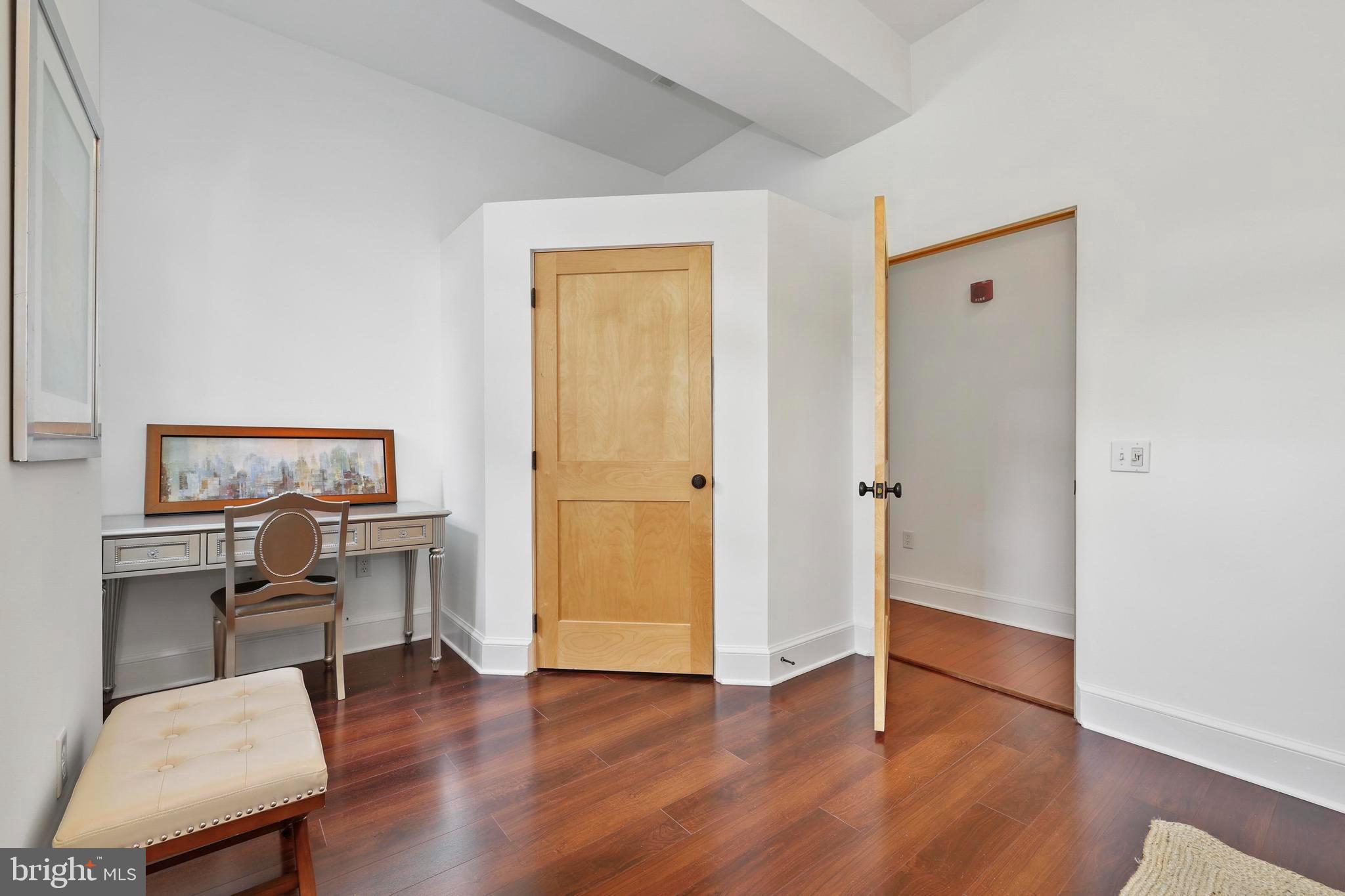 9610 Dewitt Drive, Unit BB03 Silver Spring, MD 20910 - Photo 18 of 28 a view of a livingroom with furniture and wooden floor