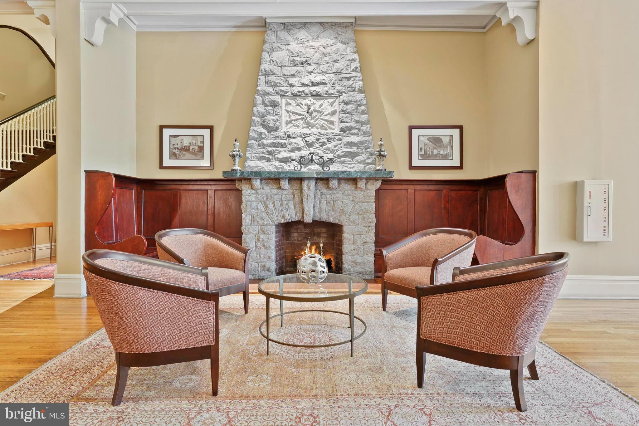 9610 Dewitt Drive, Unit BB03 Silver Spring, MD 20910 - Photo 23 of 28 a living room with furniture and a fireplace