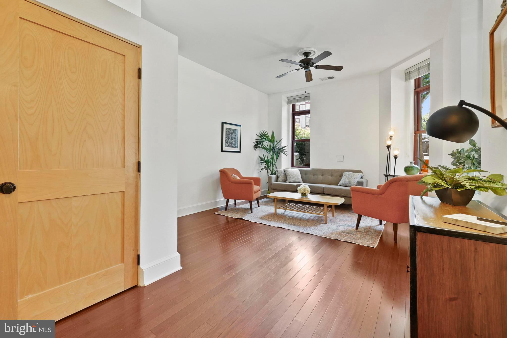 9610 Dewitt Drive, Unit BB03 Silver Spring, MD 20910 - Photo 5 of 28 a living room with furniture and a wooden floor