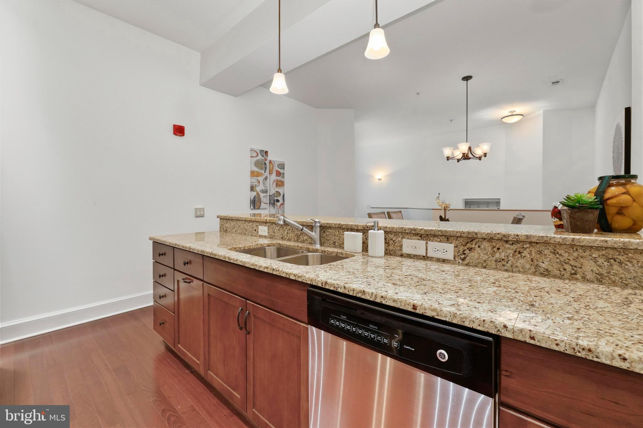 9610 Dewitt Drive, Unit BB03 Silver Spring, MD 20910 - Photo 9 of 28 a bathroom with a sink and a mirror