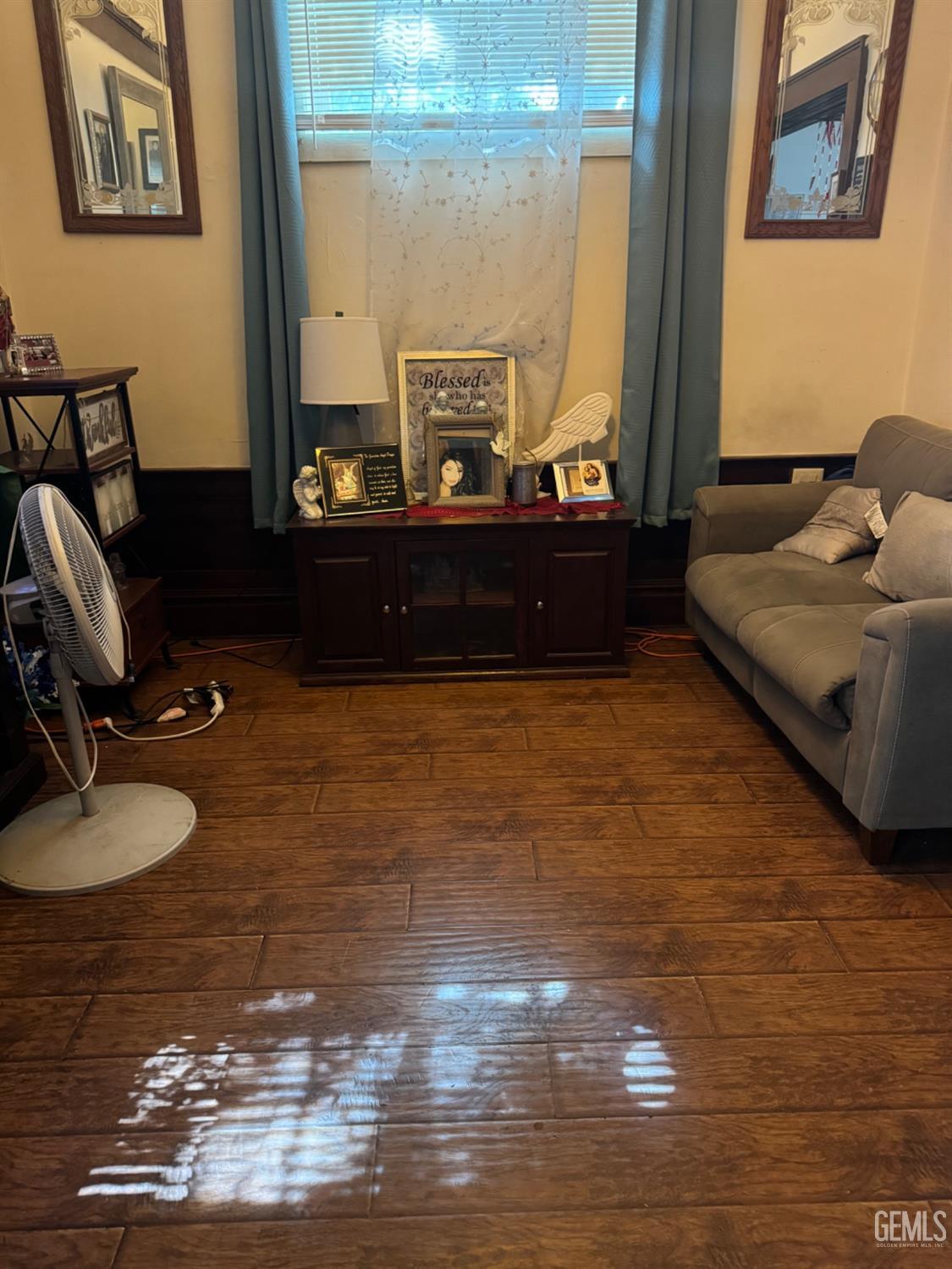 Undisclosed Address Fresno, CA 93728 - Photo 16 of 31 a living room with table chairs and wooden floor