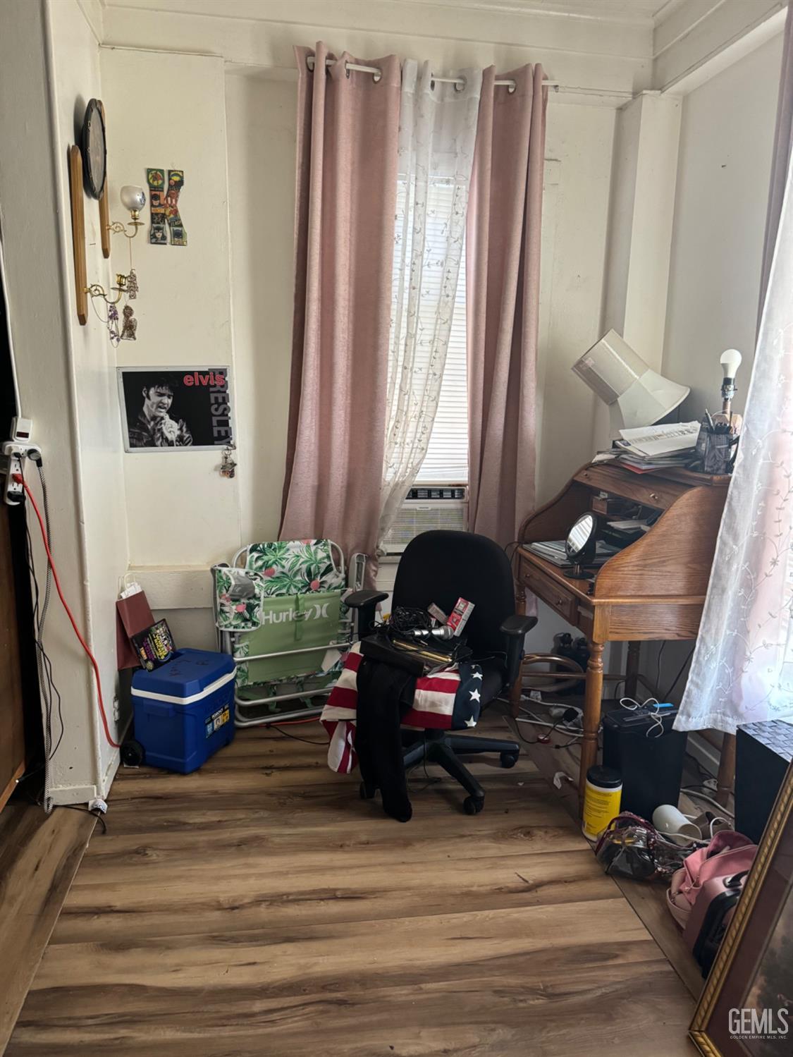 Undisclosed Address Fresno, CA 93728 - Photo 8 of 31 a living room with furniture and a fireplace