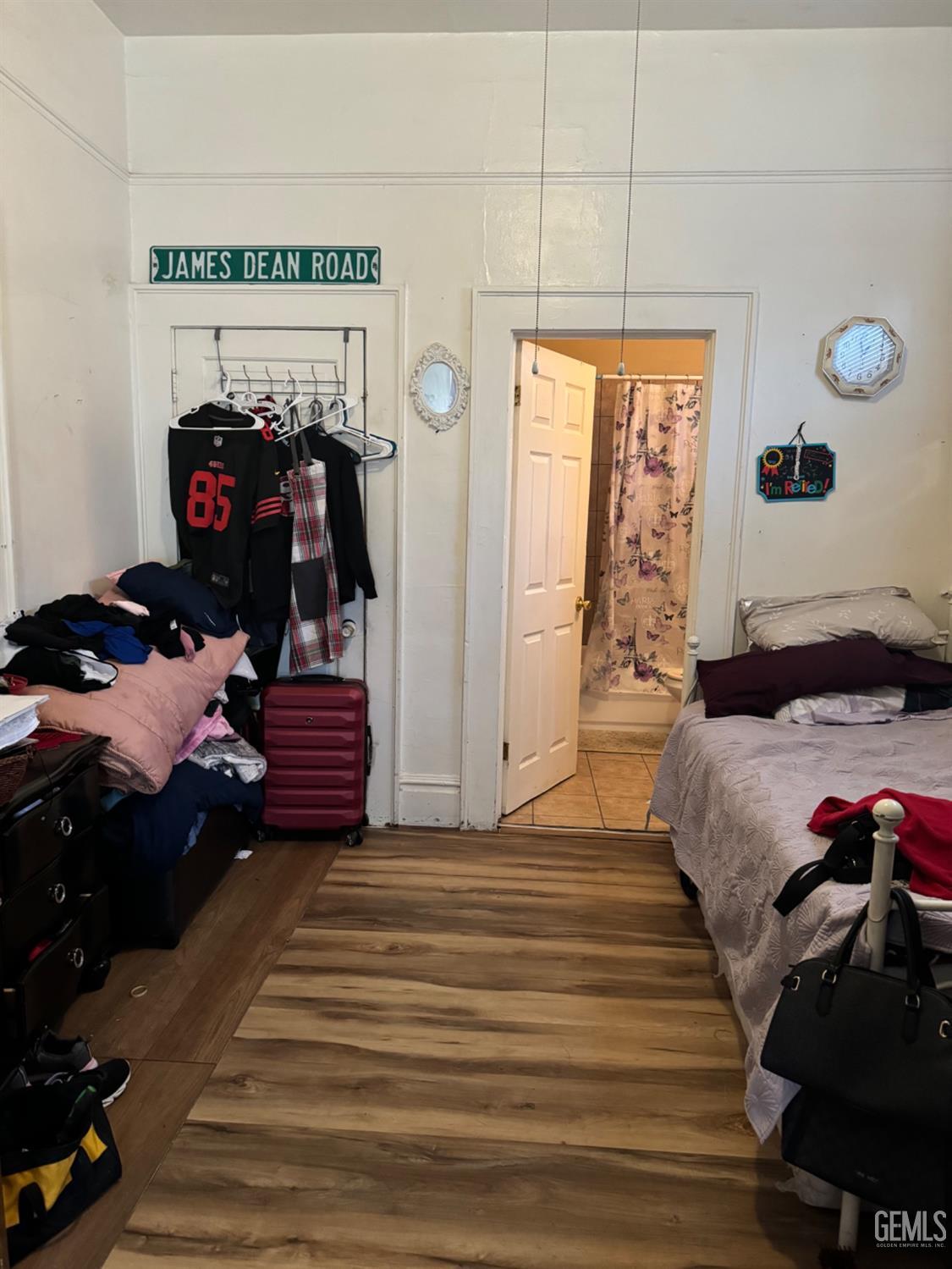 Undisclosed Address Fresno, CA 93728 - Photo 9 of 31 a bedroom with a bed and a closet