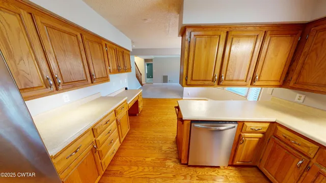 a hallway with washer and dryer