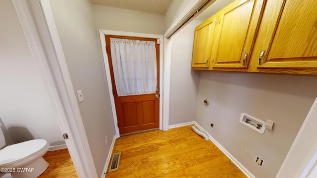 a bath room with a sink and a toilet
