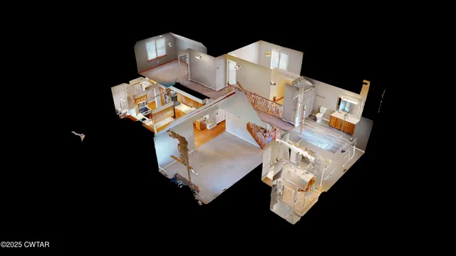 a white bed sitting in a bedroom next to a lamp