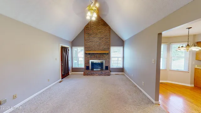 a view of a livingroom with a fireplace