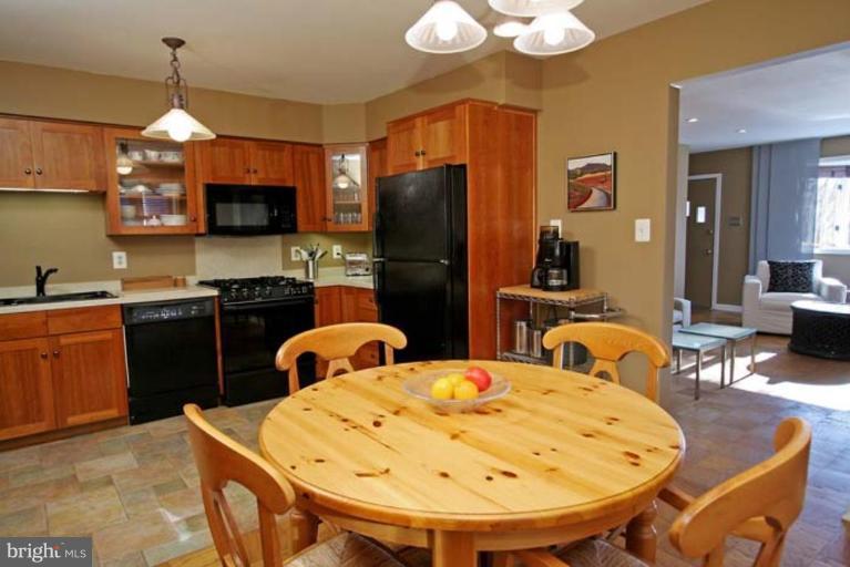 100 West Braddock Road, Unit B Alexandria, VA 22301 - Photo 5 of 21 Cherry cabinets, upgraded appliances, sleek style
