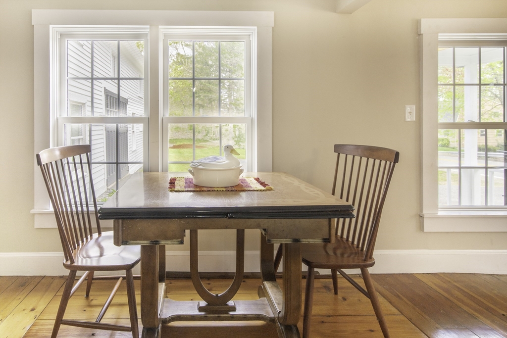 301 Cordaville Road Ashland, MA 01721 - Photo 11 of 41 a view of a dining room with furniture wooden floor and next to a window