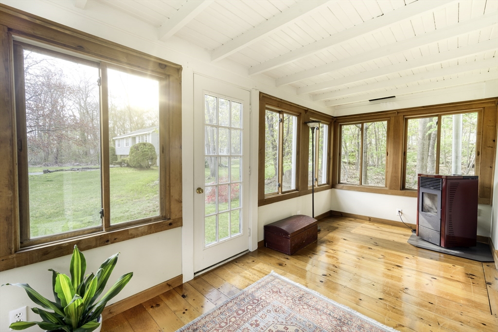 301 Cordaville Road Ashland, MA 01721 - Photo 17 of 41 a living room with furniture and a large window