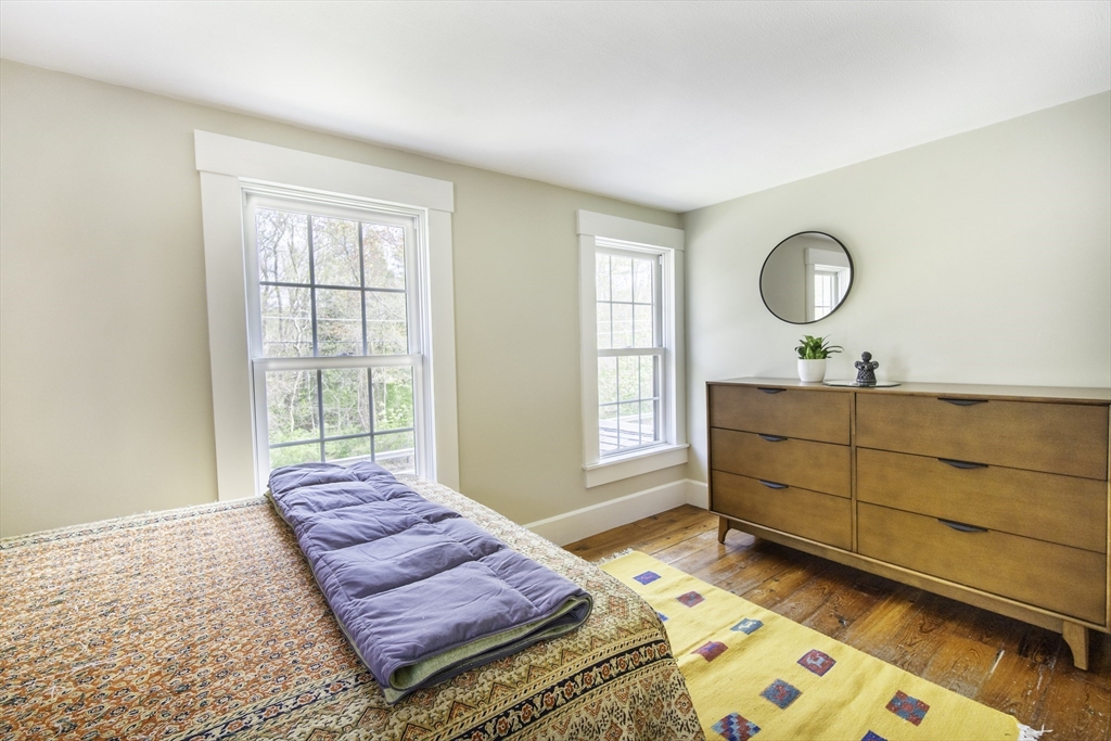 301 Cordaville Road Ashland, MA 01721 - Photo 21 of 41 a living room with couch cabinet and a window